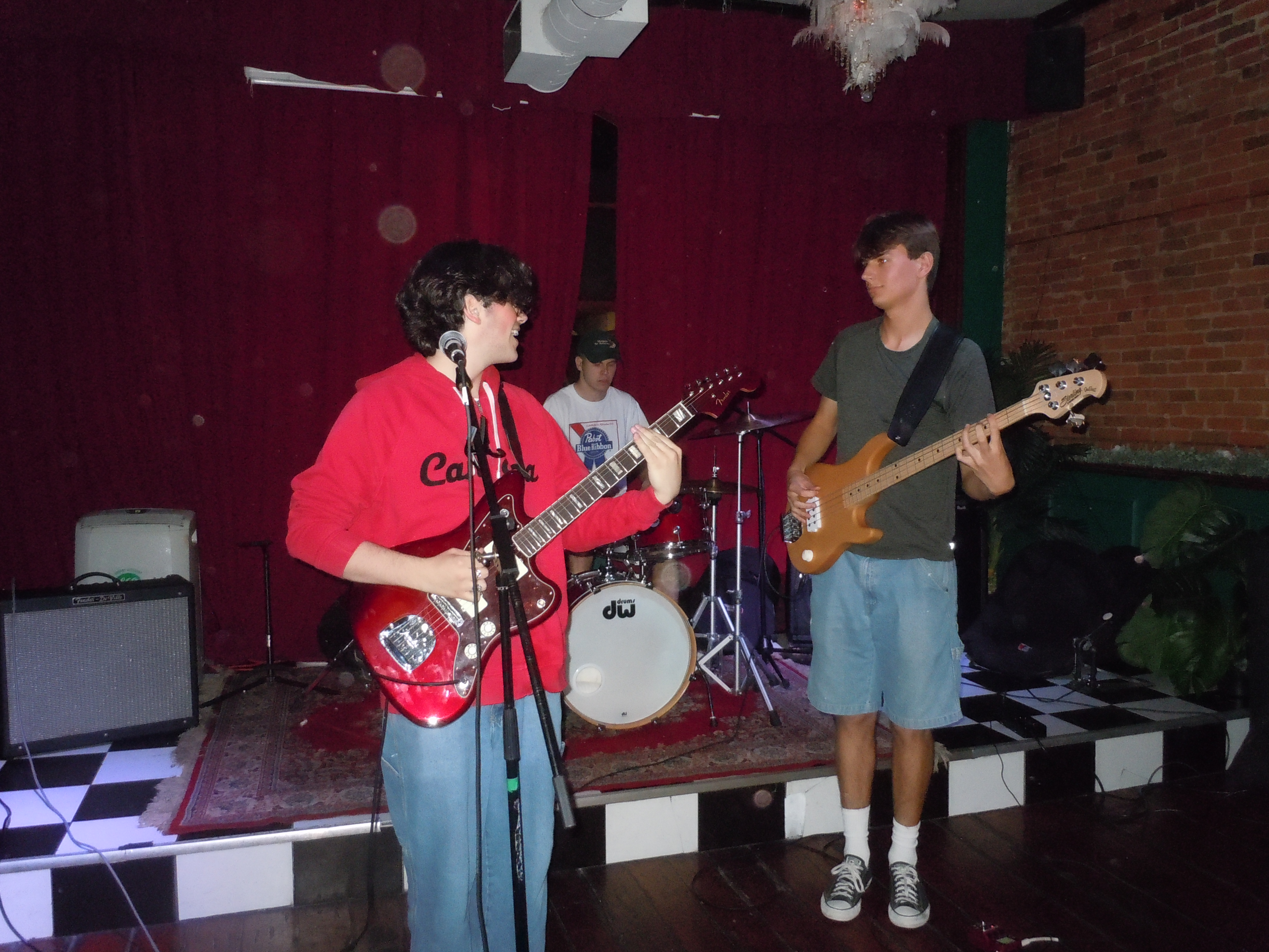 A band standing on a stage